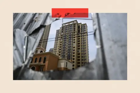 Getty Images A view of a complex of unfinished apartment buildings in Xinzheng City in Zhengzhou