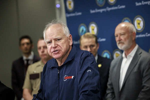 Minnesota Gov. Tim Walz speaks during a press conference at the State Emergency Operations Center on Sunday, June 15, 2025, in Blaine, Minn., following the arrest of Vance Luther Boelter in Sibley County. (Kerem Yücel/Minnesota Public Radio via AP) Photos show arrest of suspect in the shooting of lawmakers in Minnesota following a huge search