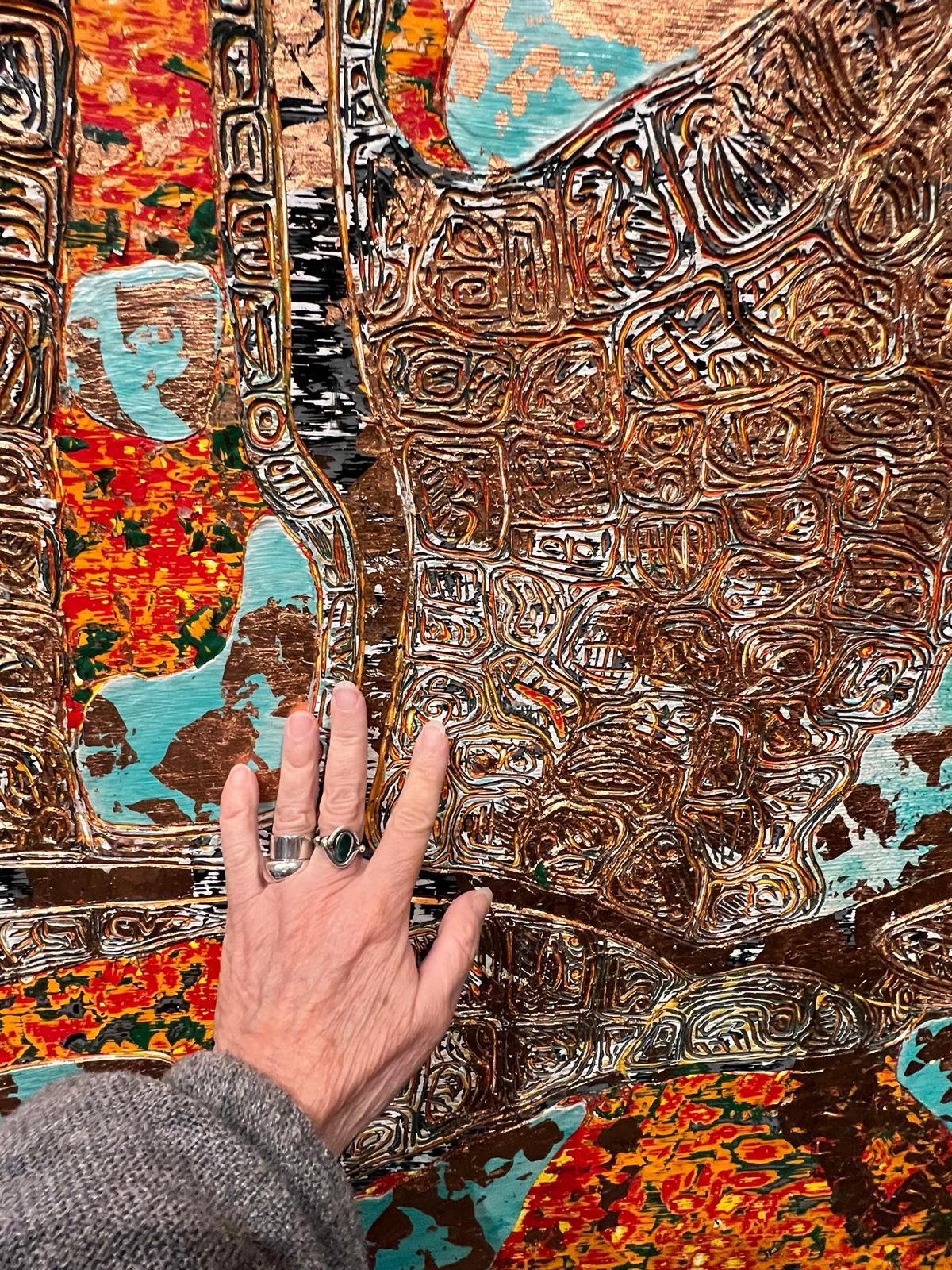 Eva Malhotra encourages visitors to feel the texture of her work