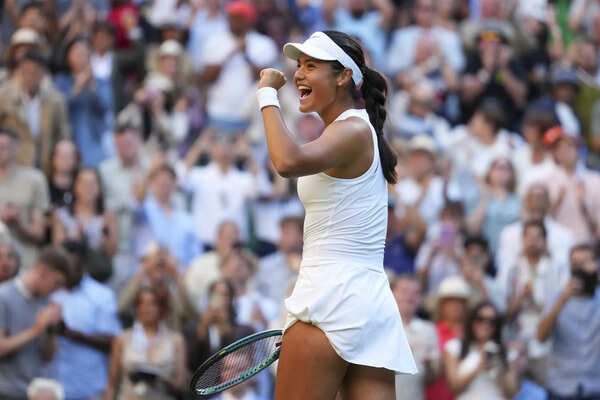 Emma Raducanu celebrates winning the second round women's singles match against Marketa Vondrousova at the Wimbledon Tennis Championships in London. (AP) APTOPIX Britain Wimbledon Tennis