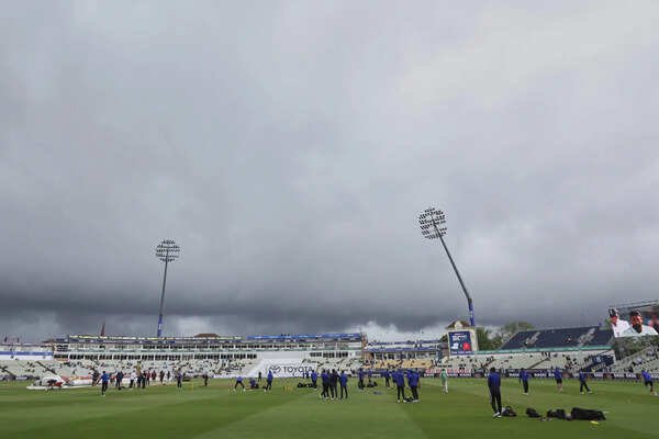 Dark clouds loom over Edgbaston cricket ground as players train before the start of play on day five of the second cricket test match between England and India in Birmingham (AP Photo/Scott Heppell) Rain delays India's bid to finish off England in second test at Edgbaston