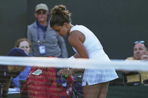 Wimbledon 2024 finalist Jasmine Paolini packs up to leave the court after losing to Kamilla Rakhimova in the second round at the 2025 Wimbledon Tennis Championships. (AP) Seeds keep tumbling at Wimbledon as No. 4 Paolini loses to Rakhimova in second round